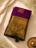 Vaijayanti Royal Purple Kanjipuram Silk Saree with Gold Zari Border and Green Tassel